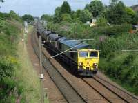 66605 with a train of empty coal hoppers from Leeds bound for Hunterston on 16th July<br><br>[Graham Morgan 16/07/2008]