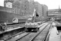 Photograph taken looking along platform 6 at Aberdeen in the Autumn of 1973 as a pair of Swindon class 120 DMUs leaves with an Inverness service from platform 9, thus avoiding the major redevelopment work affecting much of the north end of the station at that time.<br><br>[John McIntyre /09/1973]