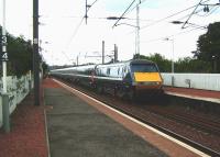 A National Express East Coast train on the Kings Cross - Glasgow Central route accelerates west through Slateford on 30 July 2008.<br><br>[David Panton 30/07/2008]