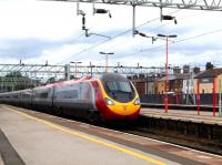 A Pendolino pulls into Stafford platform 4 on 16 August 2008.<br><br>[Don Smith 16/08/2008]