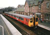 314 213 calls at Uddingston with a Dalmuir service in March 1998.<br><br>[David Panton 19/03/1998]