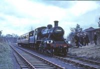 <h4><a href='/locations/C/Currie_2nd'>Currie [2nd]</a></h4><p><small><a href='/companies/B/Balerno_Branch_Caledonian_Railway'>Balerno Branch (Caledonian Railway)</a></small></p><p>BR Standard class 2 2-6-0 no 78046 with the 1965 <I>Scottish Rambler no 4</I> railtour on 19 April 1965. The photograph is thought to have been taken at Currie, with the old goods shed standing in the background see image <a href='/img/3/300/index.html'>3300</a>. 24/81</p><p>19/04/1965<br><small><a href='/contributors/G_W_Robin'>G W Robin</a></small></p>