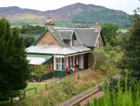 The former station at Edderton, Ross-shire (1864), attractively converted for private use, seen here looking towards Bonar Bridge on 30 August 2007. Passenger services were withdawn from Edderton in June 1960. <br><br>[John Furnevel 30/08/2007]