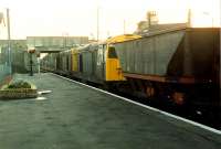 A couple of class 20s head into the sunset with coal empties at Kilwinning in 1989.<br><br>[Ewan Crawford //1989]