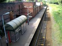 View from the road bridge at the east end of Lytham station looking towards St Annes on 22 August 2008. The platform shelter is a far cry from the splendour of the former station building, now converted to a restaurant and operating as the <I>Station Tavern</I>. [See image 20528]<br><br>[John McIntyre 22/08/2008]