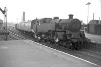 Standard 2-6-4T 80107 shunts the north side parcels/goods platform at the west end of Paisley Gilmour Street in July 1963, with Stoneybrae signal box visible in the left background.<br><br>[Colin Miller 10/07/1963]