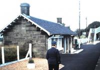 The now demolished eastbound platform waiting room at West Calder seen in October 1985...and one of those seldom photographed hats.<br><br>[David Panton 11/10/1985]