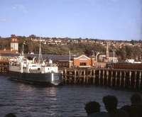 Passing Wemyss Bay on a Clyde steamer on 31 May 1969 with the ferry <I>Arran</I> at the pier. In the centre is the entrance to the covered walkway leading up to the station concourse. The steamer was on a special excursion from Greenock calling at Gourock (where I joined), Kilmun, Dunoon, then through the Kyles of Bute to Brodick before returning via Ardrossan. <br>
<br><br>[John McIntyre 31/05/1969]