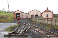 The Bushmill and Giants Causeway Railway has been relaid on the easternmost end of a tramway closed in 1949, using equipment from the Shanes Castle Railway.  On my visit the loco in use was <i>Shane</i>, formerly Bord na Mona No.3,<br>
built by Andrew Barclay of Kilmarnock in 1949. View of the terminus with carriage and loco shed. 5 August 2008.<br><br>[Bill Roberton 05/08/2008]