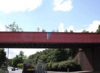 The bridge that carried the line from Jerviston Junction (Mossend) into BSC Ravenscraig, seen spanning Merry Street, Motherwell in October 2008. The bridge has now been removed and shipped to Boat of Garten on the Strathspey Railway. It will eventually carry the SRS extension to Grantown on Spey over the River Dulnain.<br><br>[Mick Golightly 27/10/2008]