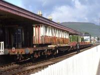 Components of the former Merry Street bridge about to leave Aviemore on the SRS line to Boat of Garten behind a Strathspey Railway class 31 locomotive.<br><br>[Mick Golightly //]
