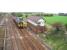 A Blackpool North to Liverpool service, with 156426, takes the fast lines at Kirkham North Junction past the impressive signal box to avoid the station island platform and continue non stop to Preston. <br><br>[Mark Bartlett 26/04/2008]