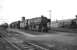 A mix of DB motive power at Rheine shed in 1976. On the left stand several electric locomotives, in the centre are two class 043 2-10-0s and next to the building on the right is a class 042 2-8-2.<br>
<br><br>[John McIntyre //1976]