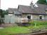 The small lever frame that operates the signals at Burneside crossing on the Windermere branch, outside the former crossing keepers cottage. <br><br>[Mark Bartlett 30/08/2008]