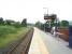 Formerly a double track station, Burneside is now a single platform on the former Up side but this has been refurbished by Trans Pennine Express. View towards Staveley and Windermere over the other Burneside level crossing, this time controlled by automatic lights.<br><br>[Mark Bartlett 30/08/2008]