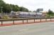 View of Uphall station from the verge above the underpass on the north side of the M8 as a Waverley - Bathgate service arrives on 11 September 2008, alongside ongoing work on the new platform.<br><br>[John Furnevel 11/09/2008]
