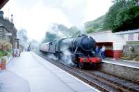 Austerity 2-10-0 <I>Dame Vera Lynn</I> climbs into Goathland up the 1 in 49 with a train for Pickering in July 1989.<br><br>[Colin Miller 11/07/1989]