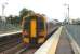 Not the usual type of unit used on this route, 158 734 is seen at Gartcosh on 17 September with a Glasgow Queen Street to Cumbernauld service<br><br>[David Panton 17/09/2008]