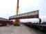 Sections of the former Merry Street bridge in the process of being transferred from road to rail at Mossend Euroterminal in preparation for their journey north to the Strathspey Railway on 3 October.<br><br>[Mick Golightly 03/10/2008]