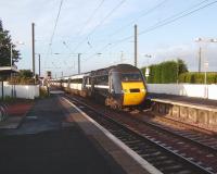 An eastbound HST on the level crossing at Kirknewton on 11 October heading for Waverley.<br><br>[David Panton 11/10/2008]