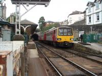 View from the foot crossing at Knaresborough in the York direction through the station towards the tunnel under the town. 144020 has arrived from Leeds and is now waiting to return there via Harrogate. <br><br>[Mark Bartlett 11/10/2008]