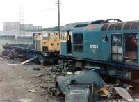 27202 in the process of being cut up at St Rollox Works in June 1981 alongside the remains of a class 26.<br><br>[Colin Alexander 27/06/1981]