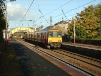 318 270 with the 1611 to Largs at Glengarnock on 15 October 2008.<br><br>[David Panton 15/10/2008]