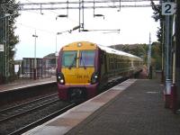334 015 draws into Langbank on 15 October with an all stations Glasgow-Gourock service.<br><br>[David Panton 15/10/2008]