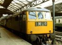E3146 on a southbound service recently arrived from Glasgow stands at the south end of Crewe station on 10 June 1971.<br>
<br>
<br><br>[John McIntyre 10/06/1971]