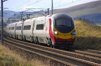A London Euston - Glasgow Central Virgin Pendolino service at speed on the approach to Lamington on 28 October 2008.<br><br>[Bill Roberton 28/10/2008]