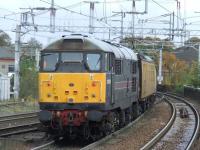 31106 <I>Spalding Town</I> at the rear of overhead line test coach <I>Mentor</I> as it crosses Wallneuk Junction after passing through Paisley Gilmour Street<br><br>[Graham Morgan 22/10/2008]