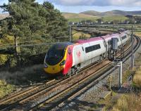 A southbound Pendolino approaching Crawford on 28 October 2008. The newly positioned signal alongside the down line has done nothing for what used to be a favourite photo location. <br><br>[Bill Roberton 28/10/2008]