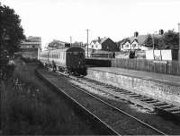 A push pull set sits at the simple terminus at Holcombe Brook after another run up the short branch from Bury. Note the side contact third rail still in place and the mineral wagon in the goods yard. The station site is now occupied by a small shopping centre (Map reference SD 780151). Undated photo but thought to have been taken on last weekend of passenger services.<br><br>[W A Camwell Collection (Courtesy Mark Bartlett) 03/05/1952]