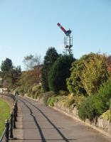 The long promenade at Grange-over-Sands is on the seaward side of the railway and follows it closely. Semaphore signals control the trains although on occasions the signal box is <I>switched out.</I><br><br>[Mark Bartlett 01/11/2008]