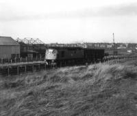 A class 26 and two fish vans on the Saturday freight leave Fraserburgh in the spring of 1972.<br><br>[John Williamson //1972]