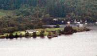 The Fort Augustus Pier station and pier viewed across Loch Ness from the slopes of the Borlum Hill. This station closed in 1906. It rejoiced in a sign saying simply <i>Pier</i>.<br><br>[Ewan Crawford 21/09/2008]