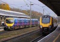 FTPE Manchester Airport-Newcastle and ArrivaXC services pass at Durham on 8 November 2008.<br><br>[Bill Roberton 08/11/2008]