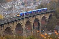 A Newcastle Central - Manchester Airport FTPE service runs south over Durham Viaduct on 8 November 2008.<br><br>[Bill Roberton 08/11/2008]