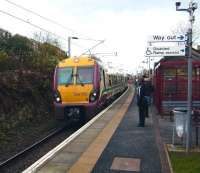 334 023 calls at Drumfrochar on 12 November with a Wemyss Bay - Glasgow Central service. Located in the southwest suburbs of Greenock this station was opened in May 1998. <br><br>[David Panton 12/11/2008]