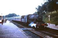 Ivatt class 2MT 2-6-0 46432 of 12D Workington shed brings a train into Cockermouth station circa 1964. After a 7 year spell at Workington, the locomotive went to Springs Branch, Wigan, from which it was eventually withdrawn by BR in May 1967. <br><br>[Robin Barbour Collection (Courtesy Bruce McCartney) //1964]