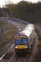 170 477 has just passed the footbridge at Alloa West with the 1041 service to Glasgow Queen Street on 19 November.<br><br>[Bill Roberton 19/11/2008]
