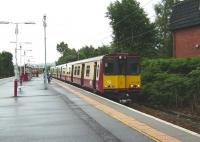 314 208 calls at Langside on a service to Glasgow Central on 9 August 2008.<br><br>[David Panton 09/08/2008]