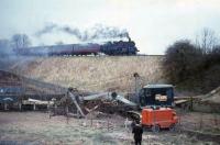 Standard tank number 80116 approaches Busby with the 17.33 from St Enoch to East Kilbride in April 1966. The colour and modus operandi of the excavator is worthy of note.<br><br>[G W Robin 14/04/1966]