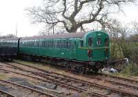 A class 207 <I>Thumper</I> DEMU repainted back into its original colours and with its old BR number stands at Hayes Knoll on the Swindon & Cricklade Railway on 22 November.<br><br>[Peter Todd 22/11/2008]