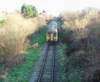 Now a single track branch with limited services but once a double track overhead electrified commuter line that also carried significant freight traffic. This is the Heysham branch looking towards Morecambe from near the ferry port as 156452 heads for Lancaster on a boat train service. <br><br>[Mark Bartlett 25/11/2008]