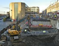 View west along Haymarket Terrace on 28 November with Haymarket station and car park on the left. The excavation work in preparation for the tramway system is being carried out on the site of the recently demolished <i>Caledonian Ale House</i>. [See image 23206]<br><br>[Bill Roberton 28/11/2008]