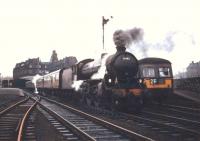 <I>Scottish Rambler No 5</I> is about to leave Ayr station on 10 April 1966 behind B1 no 61342. The railtour is seen here alongside a service DMU.  <br><br>[Robin Barbour Collection (Courtesy Bruce McCartney) 10/04/1966]