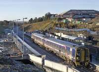 The 11.25 Bathgate - Newcraighall pauses amid scenes of work at Livingston North on 10 December 2008<br><br>[James Young 10/12/2008]