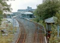 View south over the 1882 Tynemouth station in the early 1980s, with the boarded up North signal box on the right and the 4 through roads replaced by 2 realigned tracks for the new Metro. [see image 30600 for the view nearly thirty years on]<br>
<br><br>[Colin Alexander //]