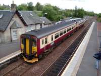 A 156 service calls at West Calder on the Edinburgh - Glasgow Central route on 28 May 2007.<br><br>[David Panton 28/05/2007]